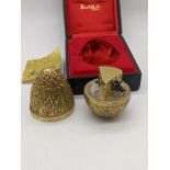 A cased Stuart Devlin silver and gilt silver surprise egg, piece 142 of a limited edition of 300