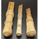 Three Georgian bone apple corers, L.16.5cm (largest)