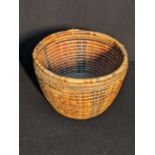 A 19th century tribal Oceanic food storage basket with hidden compartment, Karkar Island, Papua
