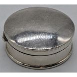 A small silver pillbox, stamped Sterling, D.3.5cm, 20g