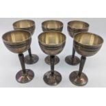 A set of six 20th century continental silver egg cups, possibly French, indistinct mark to base, H.