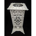 A white painted cast iron umbrella stand, chinoiserie bamboo effect, H.63cm D.23.5cm W.23.5cm