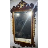 A Georgian mahogany fretwork cut wall mirror H.93.5cm W.46cm