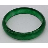 A green jade bangle, D.7cm