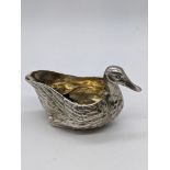 A cased Victorian silver creamer in the shape of a duck, hallmarked London, 1864, maker Edward &