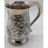 A George III silver tankard, later repoussÃ© embossed, engraved, hallmarked London, 1813, maker