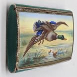 A 20th century guilloche enamel silver case depicting a flying duck, gilt interior, import marks,