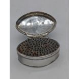 A George III silver oval nutmeg grater, initialled, hallmarked London, 1786, maker Thomas Phipps &