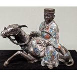 A 19th Japanese enamelled bronze of a horseback rider