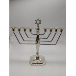 A silver menorah, hallmarked Birmingham, 1963, maker Albert Sydenham, 260g, H.23cm