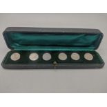 A cased set of 6 silver buttons, hallmarked Birmingham, 1902, D.2cm