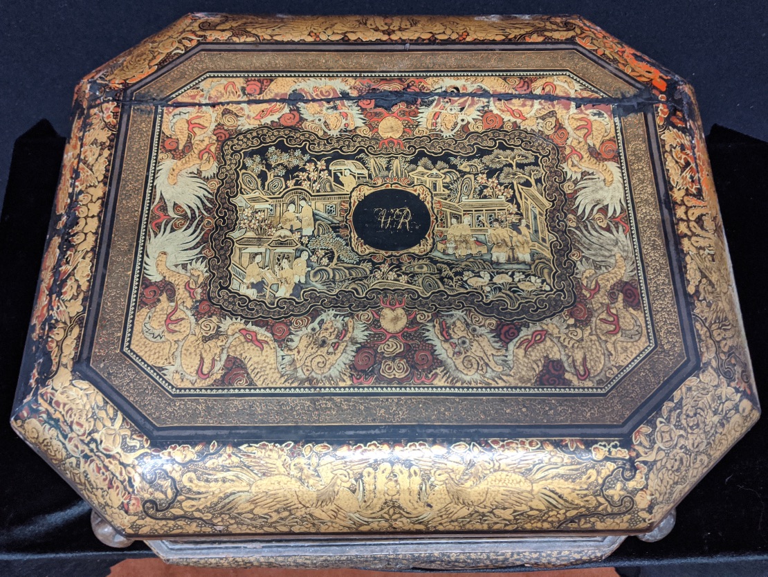 A late 18th/early 19th century Chinese export lacquered gaming box, raised on stand,