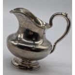 A 19th century Russian silver cream jug, 130g, H.10cm