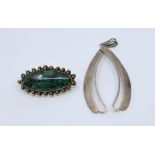 A silver malachite brooch marked 935 Israel, together with a large silver pendant marked Israel 925.