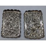 A pair of Victorian silver dishes, floral embossed designs, hallmarked Birmingham, 74g, L.10.5cm