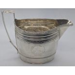 A George III silver cream jug, hallmarked London, 1799-1800, 122g, H.10cm W.13cm