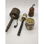 Four Chinese and Tibetan Buddhist prayer items to include 2 prayers wheels, a carved gourd etched