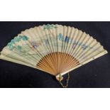 A 19th century Japanese Shibayama fan, painted scenes, ivory mounts with inlaid insects, W.43cm (