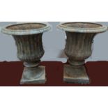 A pair of cast iron garden urns, H.53cm