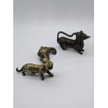 Three Indian brass and bronze animals including a bird (hamsa), a tiger and a dog-shaped padlock