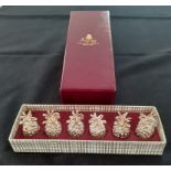 A set of six gilt metal pineapple place holders, with Aspreys box