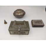 An Islamic silver box inlaid with copper scripture, L.8cm, together with another Islamic silver box,