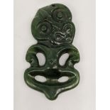 An early 20th century New Zealand Maori Hei-Tiki nephrite pendant, H.6cm W.3.5cm