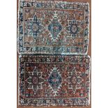 A pair of red ground prayer rugs, 80cm x 59cm (each)