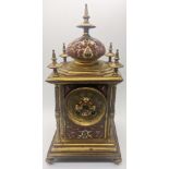 An early 20th century French red champleve enamelled brass mantel clock, 8 day movement, H.23cm