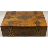 An early 20th century burr walnut veneered writing box, compartmentalised interior with inkwells,