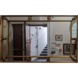 A large gilt panelled wall mirror, 91cm x 122cm