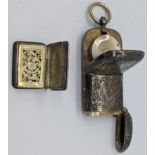 A George III silver vinaigrette, Birmingham hallmarks, together with a silver sovereign case,