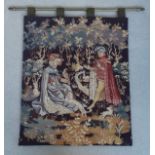 A Belgian embroidered wall hanging tapestry depicting a figural scene, 61cm x 51cm