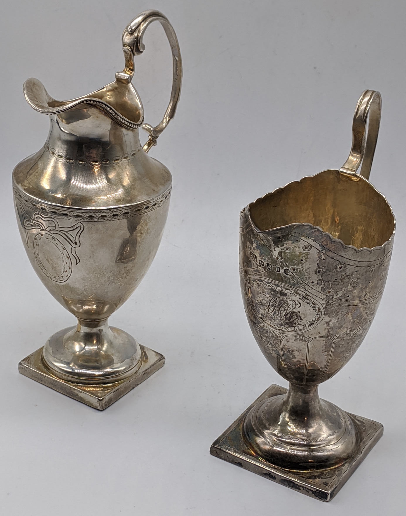 2 George IV silver cream jugs/ sauce boats, hallmarked London, 1828, maker John & Henry Lias, and