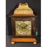 A Victorian bracket clock, mahogany cased, 8 day movement, raised on four bun feet, H.40cm