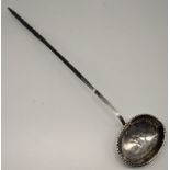 A George III silver toddy ladle, twisted bone handle, hallmarked London 1781, maker Thomas Morley,