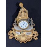 A Womelsdorf Clermont mantel clock, onyx base with applied gilt mounts, figural surmount, 8 day