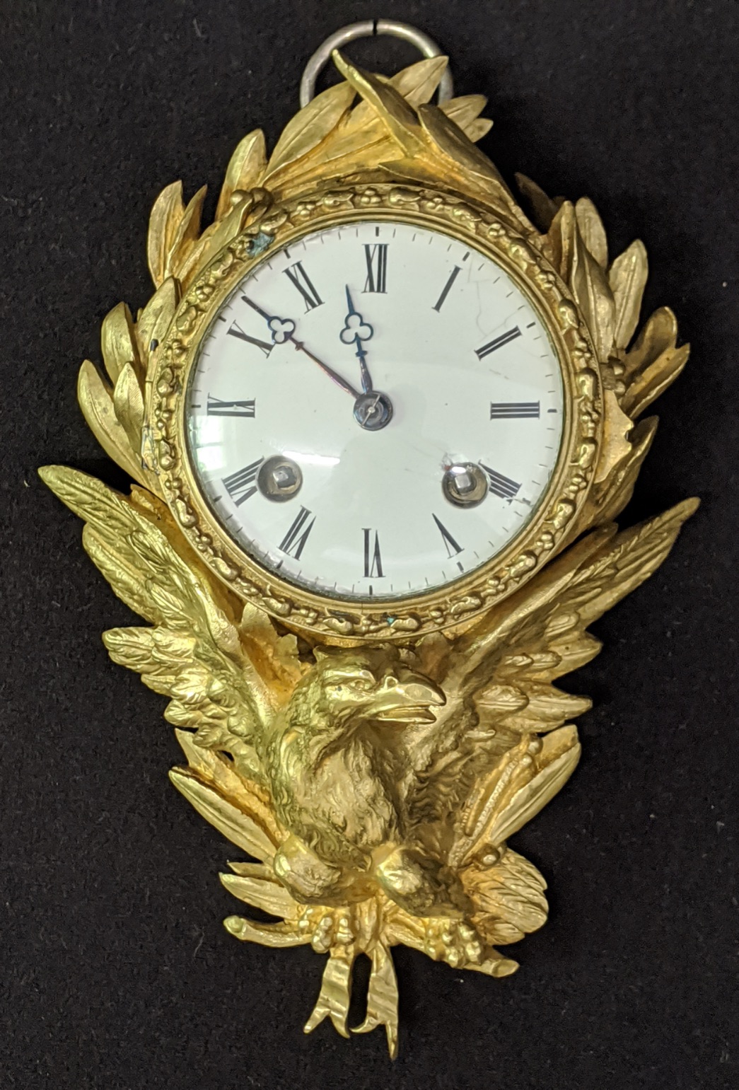 A Louis XV ormolu eagle wall clock, eight day movement, H.22cm