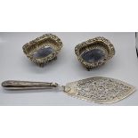 A pair of George IV sugar sifters, hallmarked London, 1822, maker George Burrows, L.10.5cm, 260g,