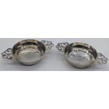 A pair of Arts and Crafts Scottish silver miniature quaich, hallmarked Edinburgh, 1916, maker