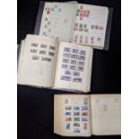 A collection of world stamp albums