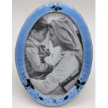 A blue guilloche enamelled silver photo frame, hallmarked Birmingham, 1911, H.17cm