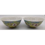 A pair of Chinese Republic period Imperial yellow ground bowls, bearing Qianlong marks to base, H.