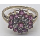 A diamond and ruby cluster ring, 9ct yellow gold mount, 2.5g,