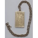 A 9ct gold ingot on a 9ct gold chain, 37g, 4cm x 2.8cm