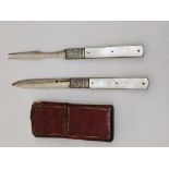 A silver and mother of pearl knife and fork, within red leather case