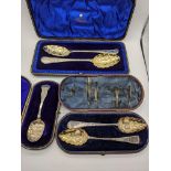 A pair of George IV silver tablespoons with etched designs, cased, together with a cased pair of