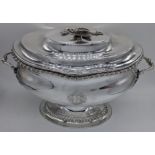 A George III silver soup tureen, twin handled, engraved armorial crest, hallmarked London, 1768,