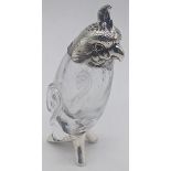 A Victorian silver bird pepper, glass body, red eyes, hallmarked London, 1883, maker Henry William