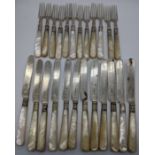 Twelve pairs of Victorian silver knives and forks with mother of pearls handles, hallmarked